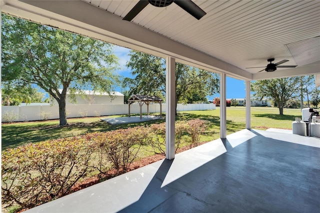 14807 Capps Estates Ln, Wimauma, FL 33598 - fenced backyard featuring ceiling fan and a patio area