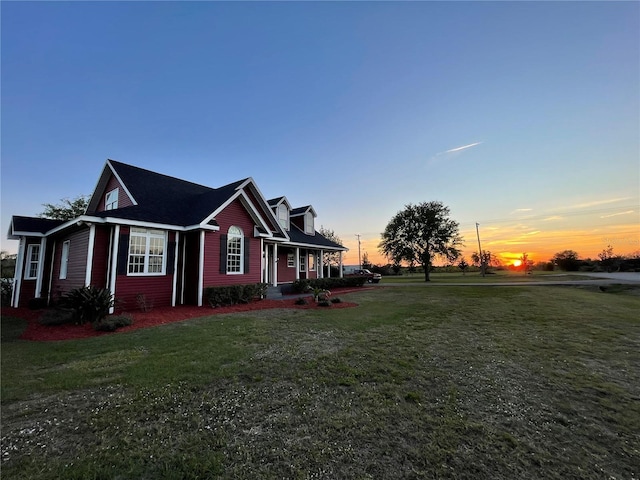 14807 Capps Estates Ln, Wimauma, FL 33598 - property exterior at dusk featuring a yard