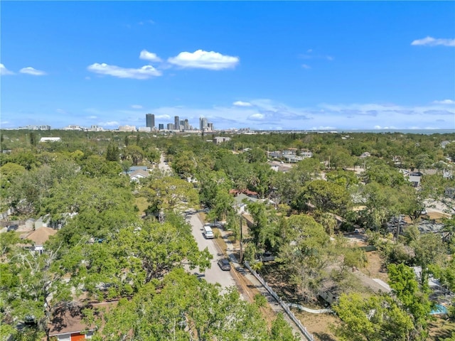 birds eye view of property with a view of city