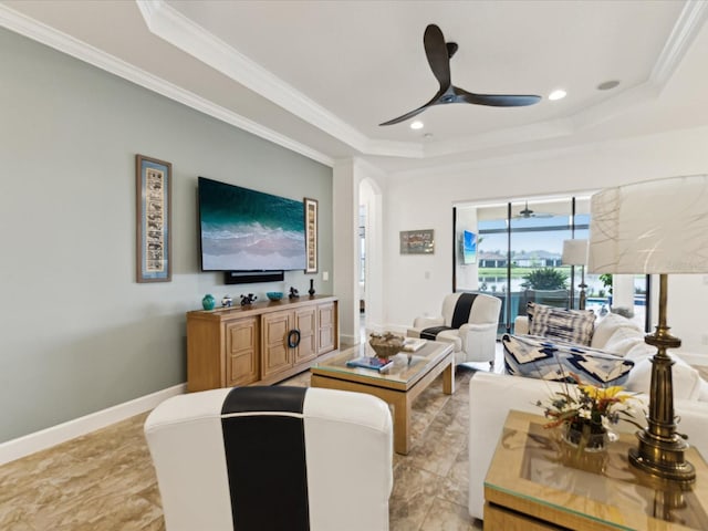 11248 Juglans Dr, Odessa, FL 33556 - living area with a tray ceiling, crown molding, baseboards, ceiling fan, and recessed lighting