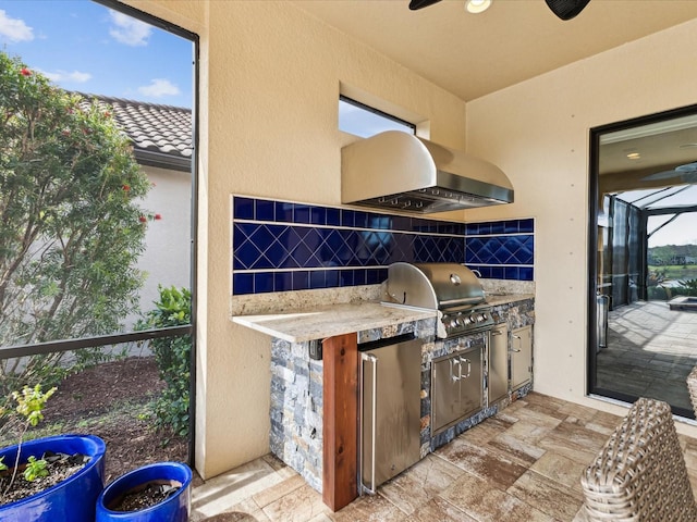 11248 Juglans Dr, Odessa, FL 33556 - view of patio / terrace with exterior kitchen and a grill