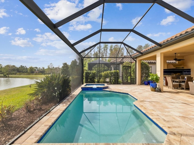 11248 Juglans Dr, Odessa, FL 33556 - view of pool featuring a pool with connected hot tub, a ceiling fan, a patio, outdoor dining area, and a water view