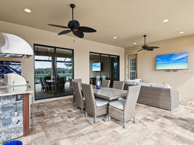 11248 Juglans Dr, Odessa, FL 33556 - view of patio with a grill, an outdoor living space, outdoor dining space, a ceiling fan, and area for grilling