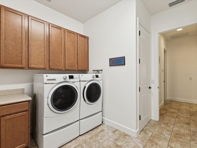 11248 Juglans Dr, Odessa, FL 33556 - washroom with independent washer and dryer, cabinet space, baseboards, and visible vents