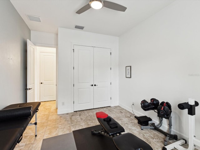 11248 Juglans Dr, Odessa, FL 33556 - workout room with baseboards, visible vents, and ceiling fan