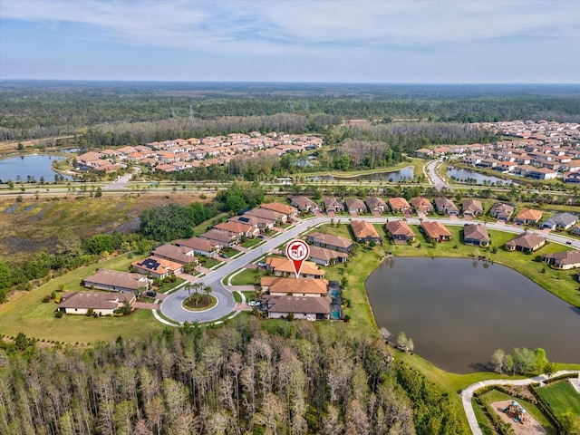 11248 Juglans Dr, Odessa, FL 33556 - drone / aerial view featuring a residential view, a water view, and a forest view