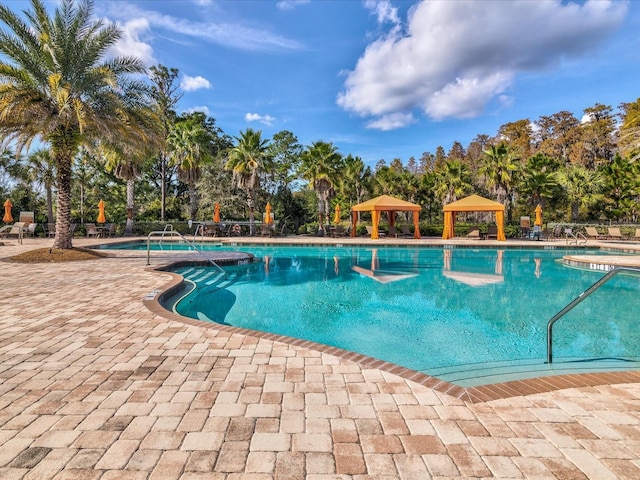 11248 Juglans Dr, Odessa, FL 33556 - community pool with a gazebo and a patio