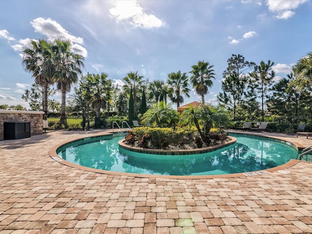 11248 Juglans Dr, Odessa, FL 33556 - community pool featuring a patio area