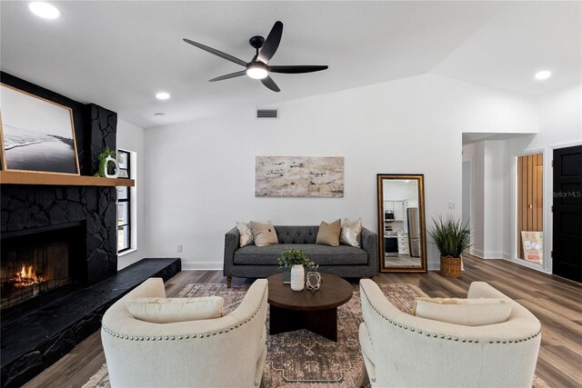 4715 Kemble Ct, Tampa, FL 33624 - living area featuring lofted ceiling, ceiling fan, visible vents, and wood finished floors