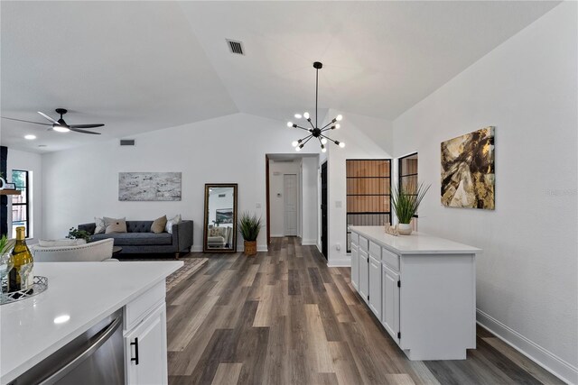 4715 Kemble Ct, Tampa, FL 33624 - kitchen featuring white cabinetry, light countertops, visible vents, and dark wood finished floors