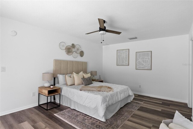 4715 Kemble Ct, Tampa, FL 33624 - bedroom with baseboards, visible vents, and dark wood finished floors