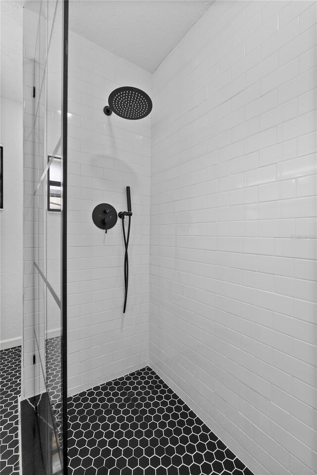 4715 Kemble Ct, Tampa, FL 33624 - bathroom featuring a shower stall