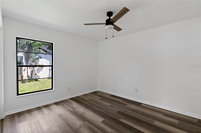 4715 Kemble Ct, Tampa, FL 33624 - spare room with baseboards, ceiling fan, and dark wood finished floors