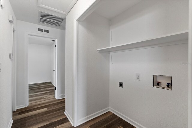 4715 Kemble Ct, Tampa, FL 33624 - laundry area featuring dark wood-style flooring, hookup for a washing machine, laundry area, and visible vents