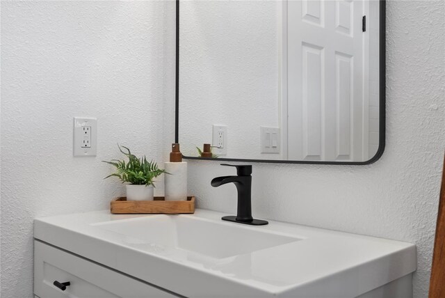 4715 Kemble Ct, Tampa, FL 33624 - room details featuring vanity and a textured wall
