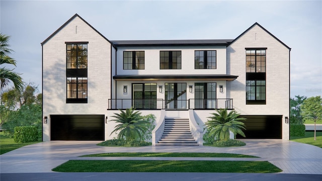 660 Geneva Pl, Tampa, FL 33606 - view of front facade featuring an attached garage, concrete driveway, and brick siding