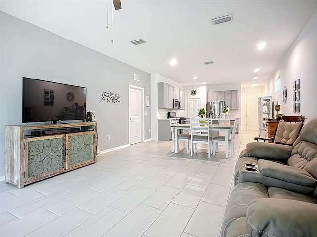 5415 Los Robles Ct, Palmetto, FL 34221 - living room featuring ceiling fan and recessed lighting
