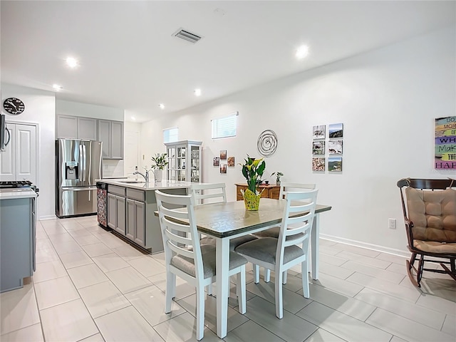 5415 Los Robles Ct, Palmetto, FL 34221 - dining room with recessed lighting and light tile patterned floors