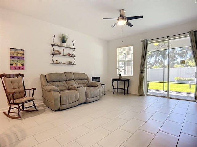 5415 Los Robles Ct, Palmetto, FL 34221 - living room featuring ceiling fan and light tile patterned flooring