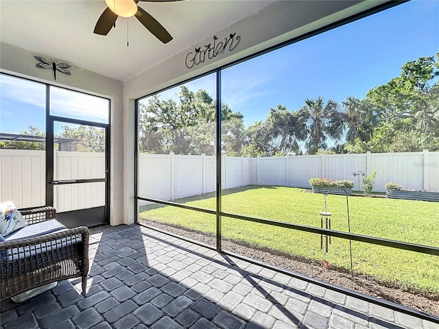 5415 Los Robles Ct, Palmetto, FL 34221 - unfurnished sunroom with a ceiling fan and plenty of natural light