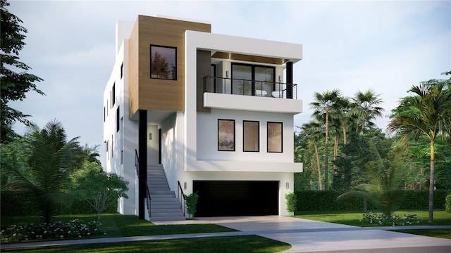 664 Geneva Pl, Tampa, FL 33606 - modern home featuring driveway, stairway, stucco siding, an attached garage, and a balcony