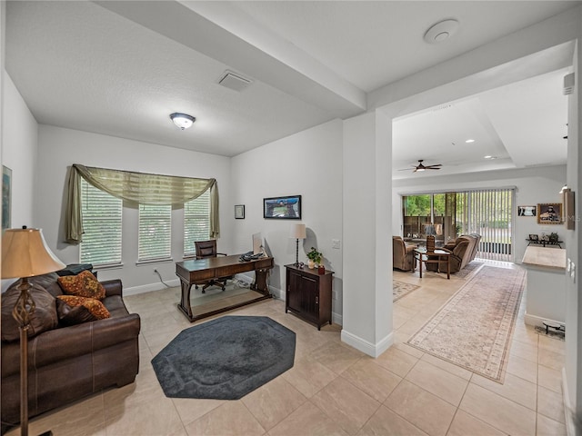 office space featuring a ceiling fan, light tile patterned floors, baseboards, visible vents, and recessed lighting