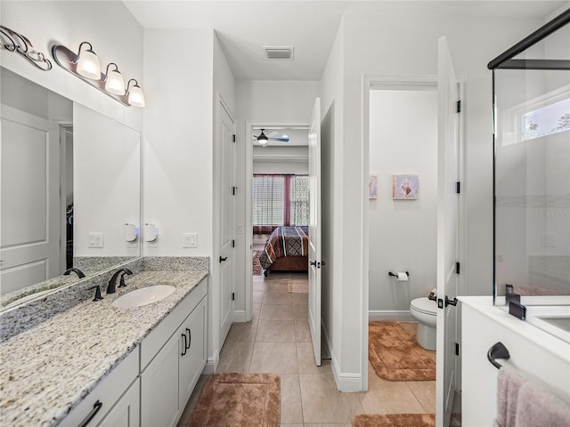 bathroom featuring visible vents, tile patterned flooring, vanity, and a ceiling fan