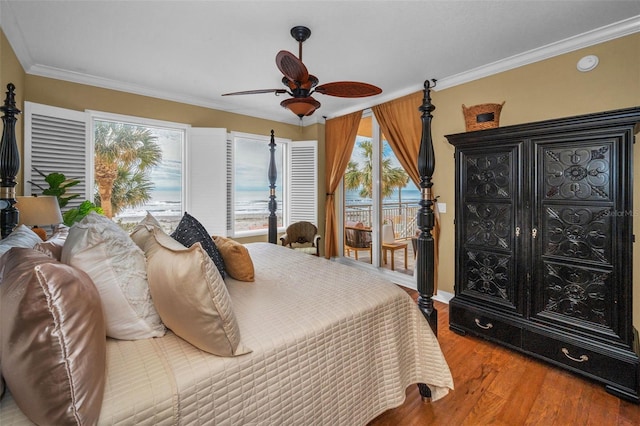 bedroom featuring wood finished floors, ornamental molding, ceiling fan, and access to outside