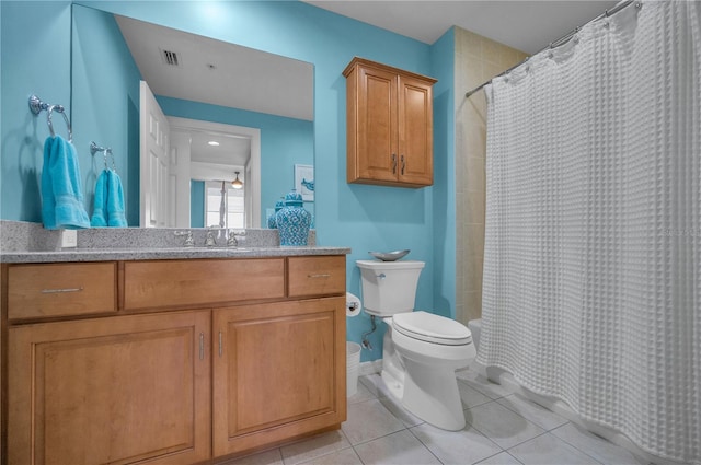 bathroom featuring toilet, visible vents, tile patterned flooring, shower / bathtub combination with curtain, and vanity