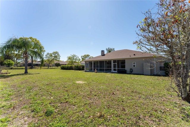 view of yard featuring a sunroom