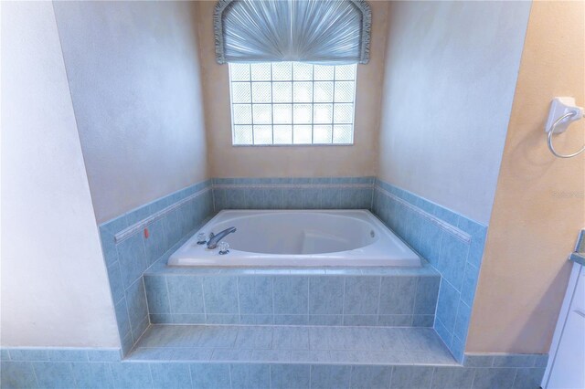 full bathroom featuring a bath