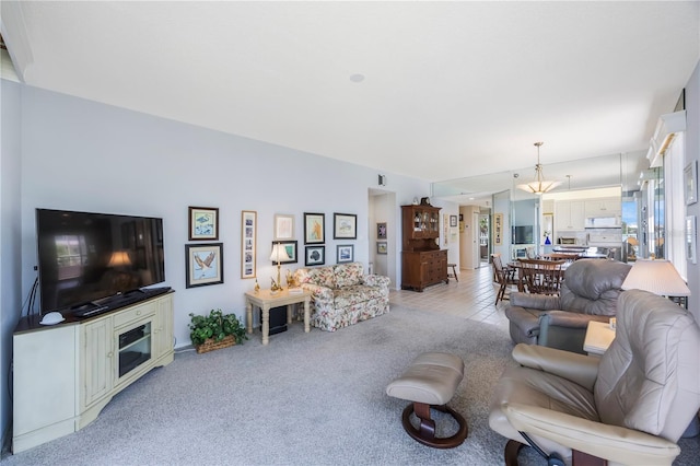 8020 Sailboat Key Blvd S Unit 101, St Pete Beach, FL 33707 - living area with light colored carpet