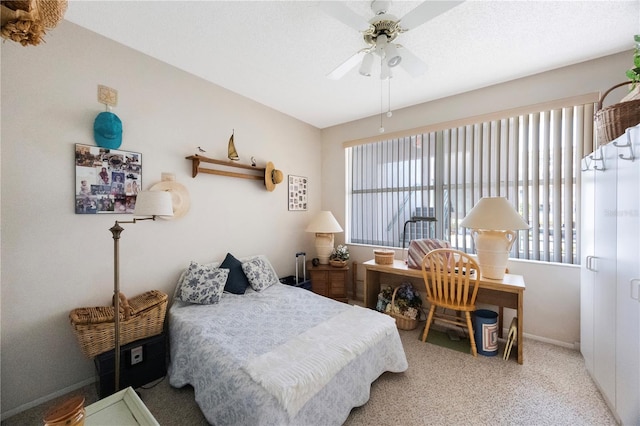 8020 Sailboat Key Blvd S Unit 101, St Pete Beach, FL 33707 - carpeted bedroom with baseboards and ceiling fan