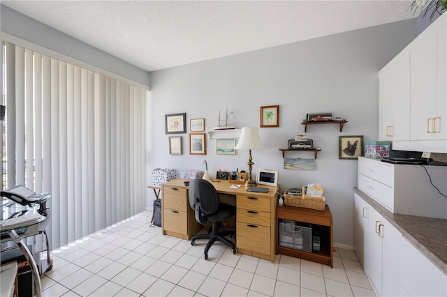 8020 Sailboat Key Blvd S Unit 101, St Pete Beach, FL 33707 - office area featuring light tile patterned floors and a textured ceiling