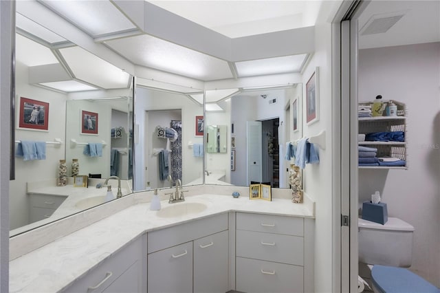 8020 Sailboat Key Blvd S Unit 101, St Pete Beach, FL 33707 - bathroom with toilet and vanity