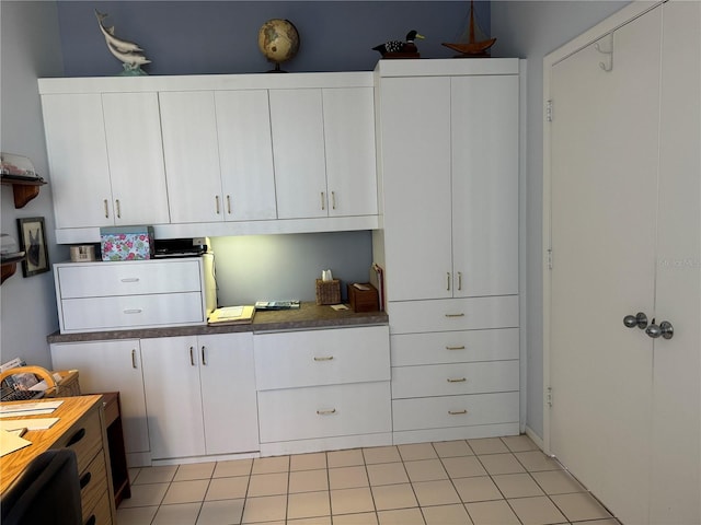 8020 Sailboat Key Blvd S Unit 101, St Pete Beach, FL 33707 - kitchen with white cabinetry