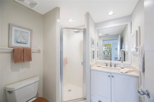 8020 Sailboat Key Blvd S Unit 101, St Pete Beach, FL 33707 - bathroom with toilet, a shower stall, vanity, and recessed lighting