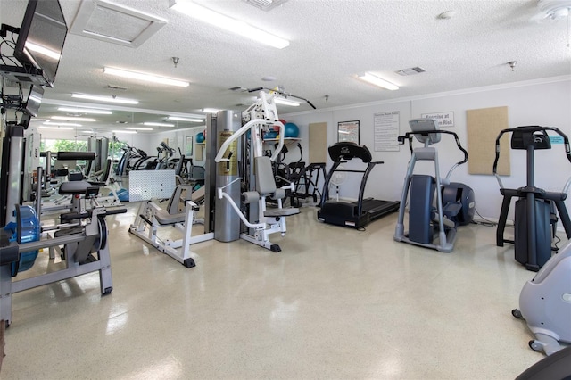 8020 Sailboat Key Blvd S Unit 101, St Pete Beach, FL 33707 - workout area featuring a textured ceiling and crown molding