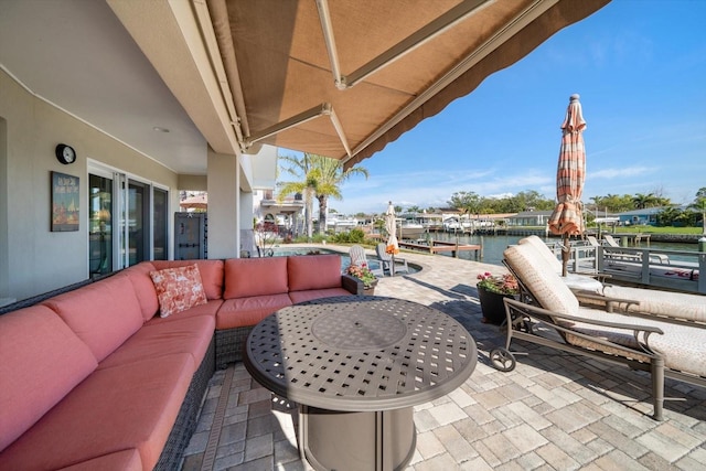 4544 Harbor Hills Dr, Largo, FL 33770 - view of patio featuring an outdoor hangout area, a water view, and a dock