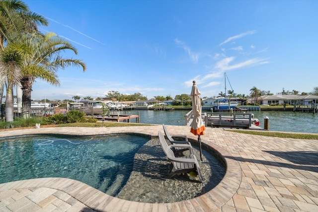 4544 Harbor Hills Dr, Largo, FL 33770 - view of swimming pool featuring a water view, a boat dock, and boat lift