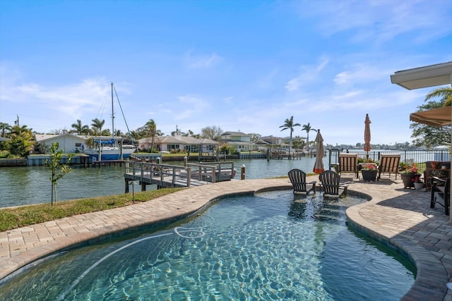 4544 Harbor Hills Dr, Largo, FL 33770 - outdoor pool with a water view and a patio area