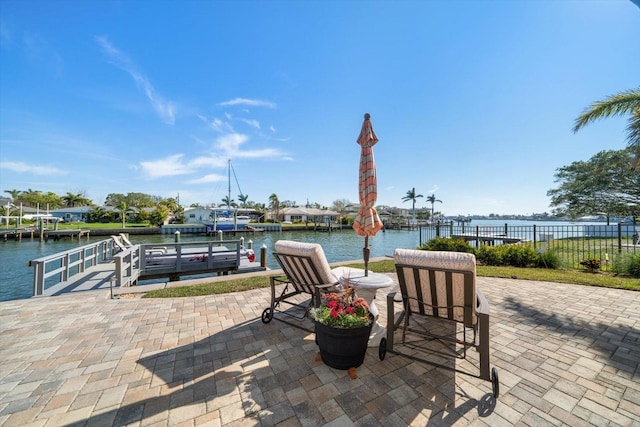 4544 Harbor Hills Dr, Largo, FL 33770 - view of patio / terrace with a water view, fence, and a dock