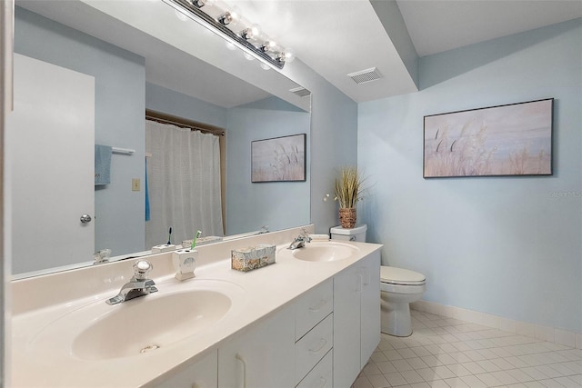 6021 Bahia Del Mar Cir Unit 137, Saint Petersburg, FL 33715 - bathroom with baseboards, visible vents, toilet, and a sink