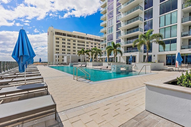 pool featuring a patio area