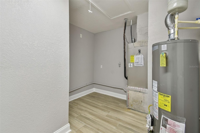 utility room with water heater