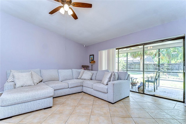 4110 Summerdale Dr, Tampa, FL 33624 - living room featuring ceiling fan, vaulted ceiling, and light tile patterned floors