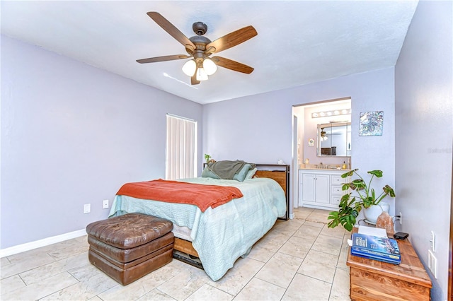 4110 Summerdale Dr, Tampa, FL 33624 - bedroom with baseboards, connected bathroom, ceiling fan, and light tile patterned flooring