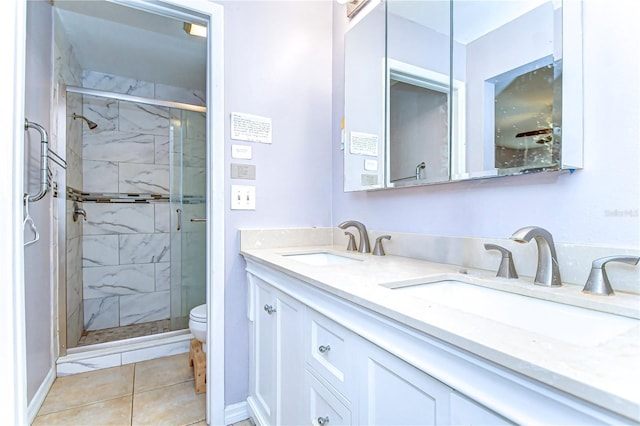 4110 Summerdale Dr, Tampa, FL 33624 - full bath featuring a stall shower, double vanity, toilet, and a sink