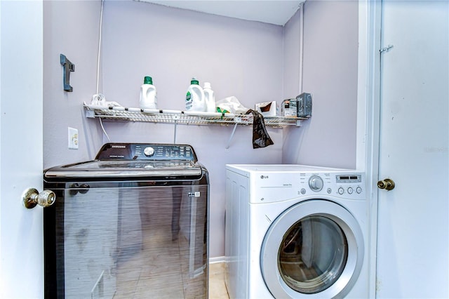4110 Summerdale Dr, Tampa, FL 33624 - washroom with laundry area and washer and dryer