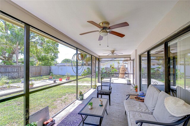 4110 Summerdale Dr, Tampa, FL 33624 - sunroom featuring a ceiling fan